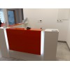 Lada recepcyjna Corner z pomarańczowymi panelami Lada recepcyjna Corner z pomarańczowymi panelami